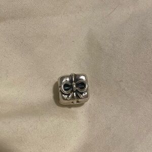 Pandora retired present silver charm